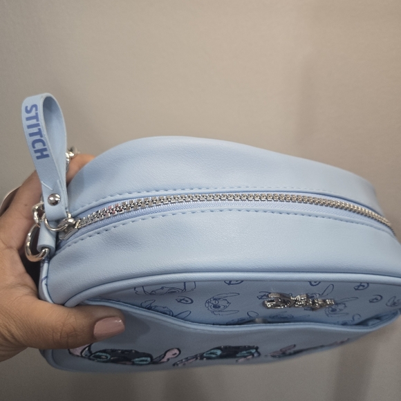 Disney’s Stitch Camera BagLight blue camera bag featuring Stitch, a chain strap - Picture 4 of 7